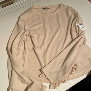 Cream colored Charlotte Russe sweater. Never before work with tag still on